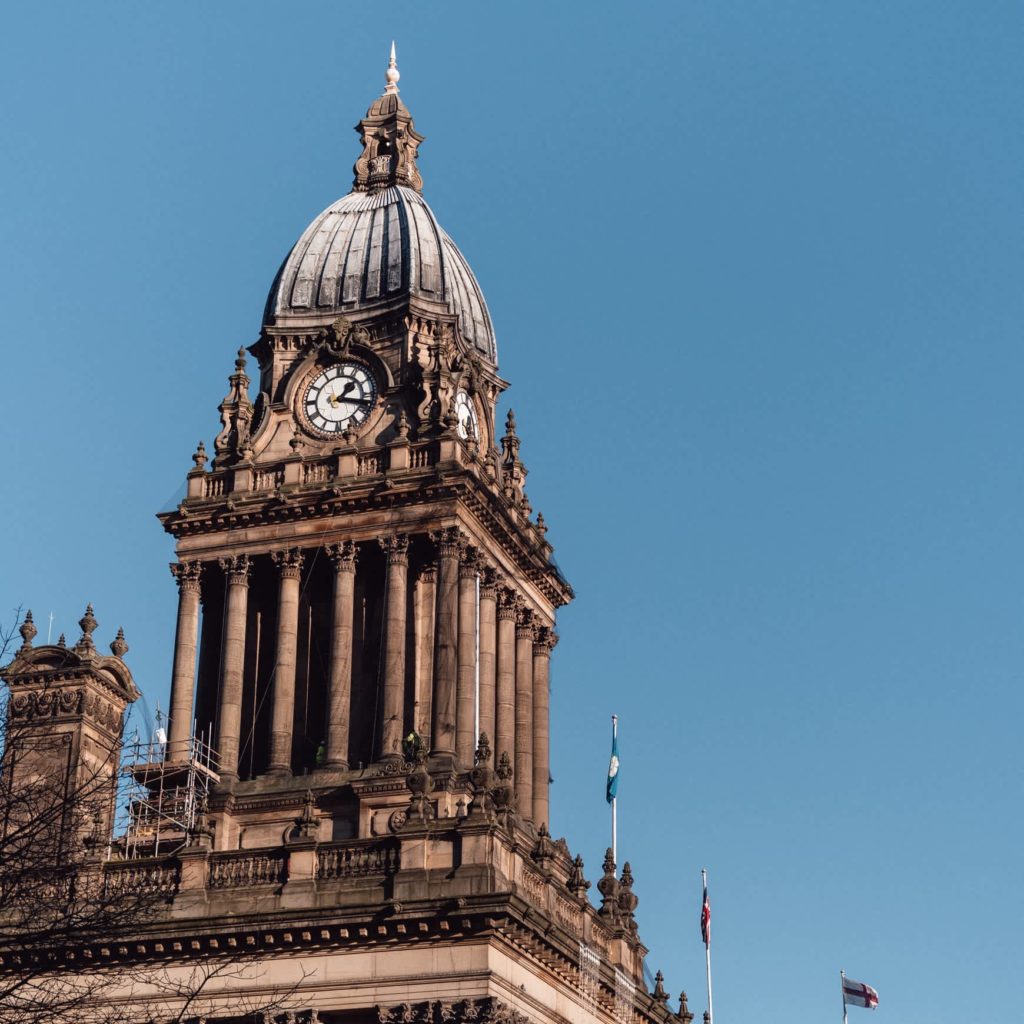 Building with a clock with clear blue sky